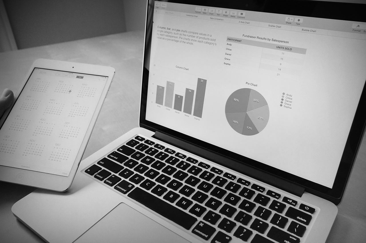 A laptop with a pie chart to represent Business Studies at East Barnet School