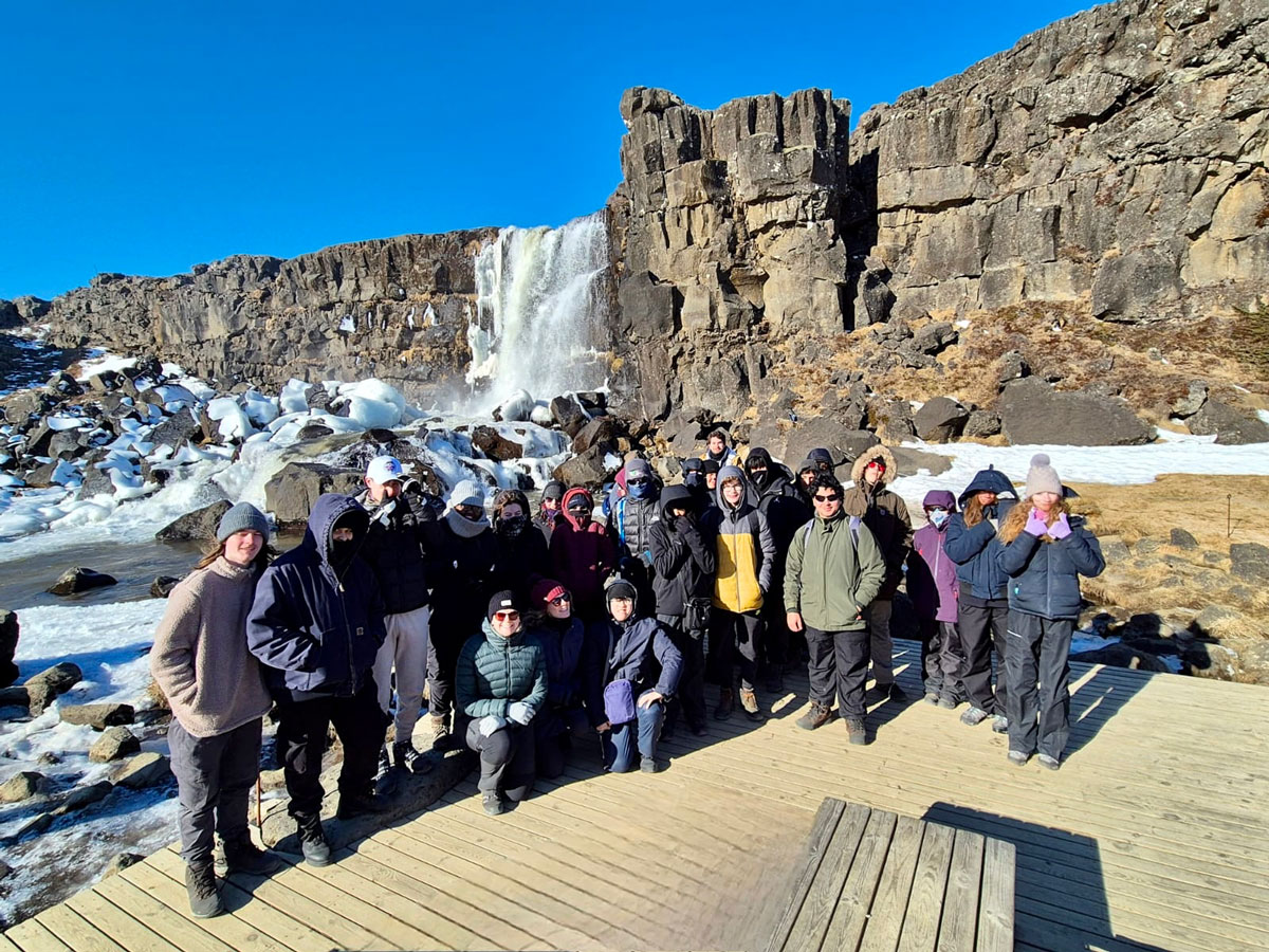 EBS students stood by the landscape in Iceland