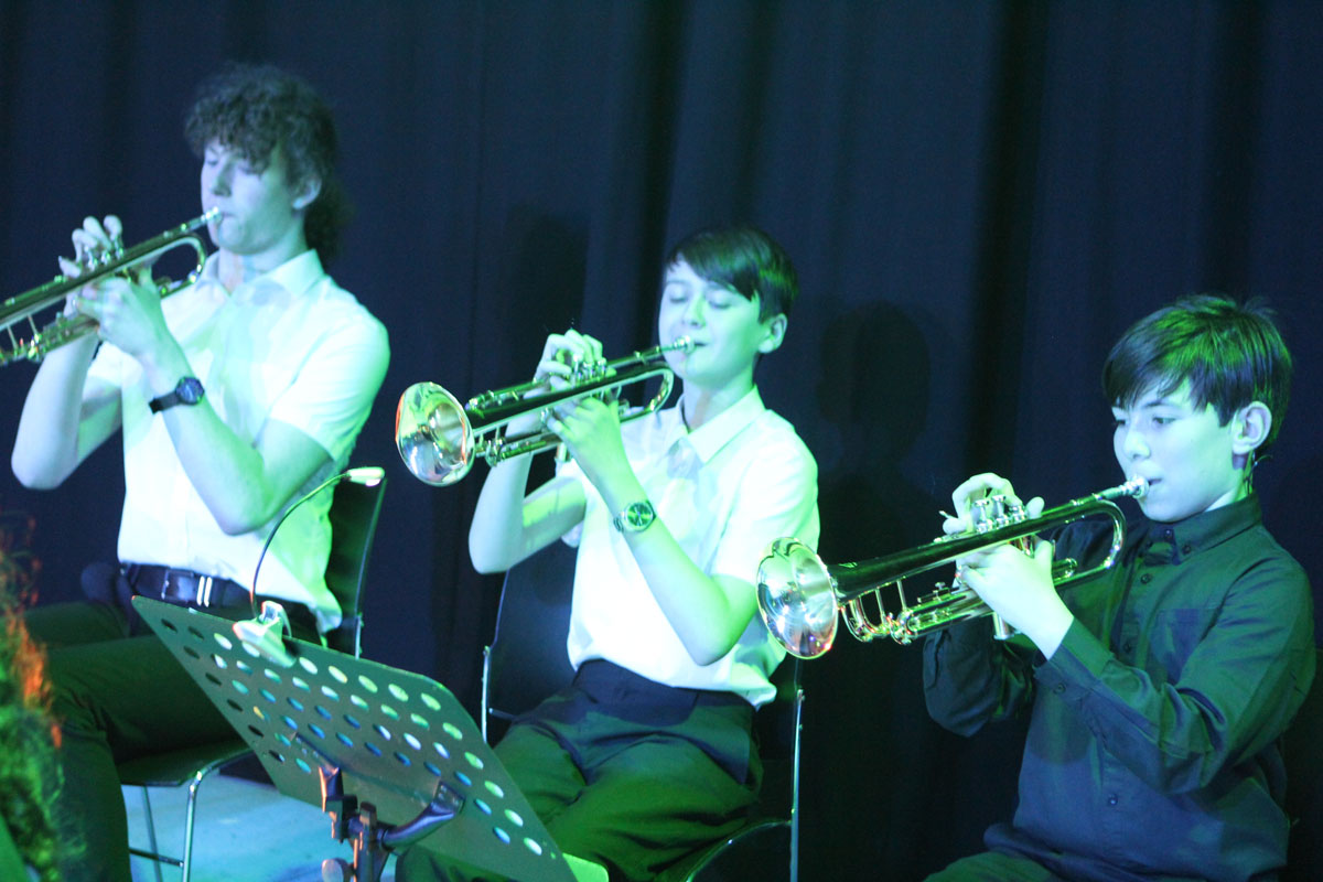 Students on brass instruments at the summer concert