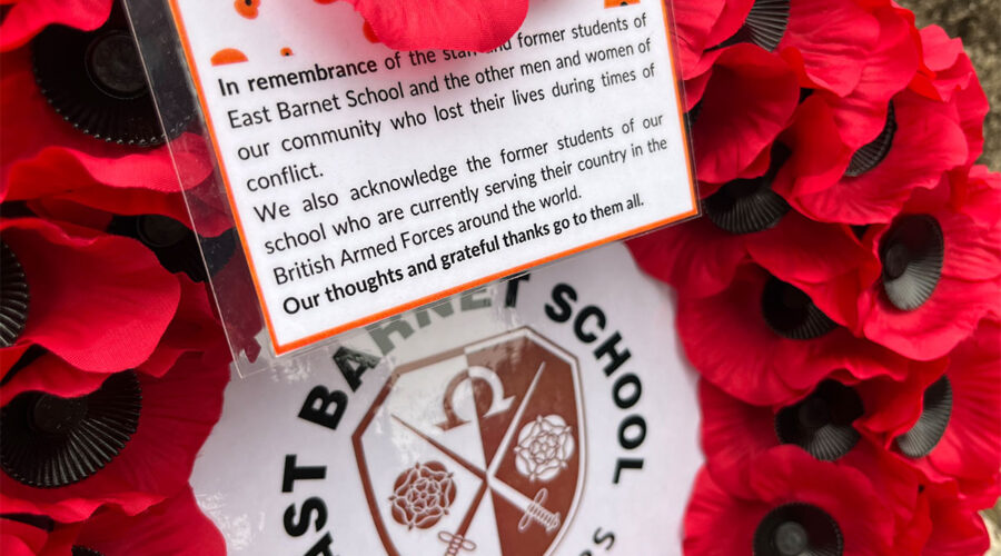 a wreath laid by east barnet school for remembrance sunday